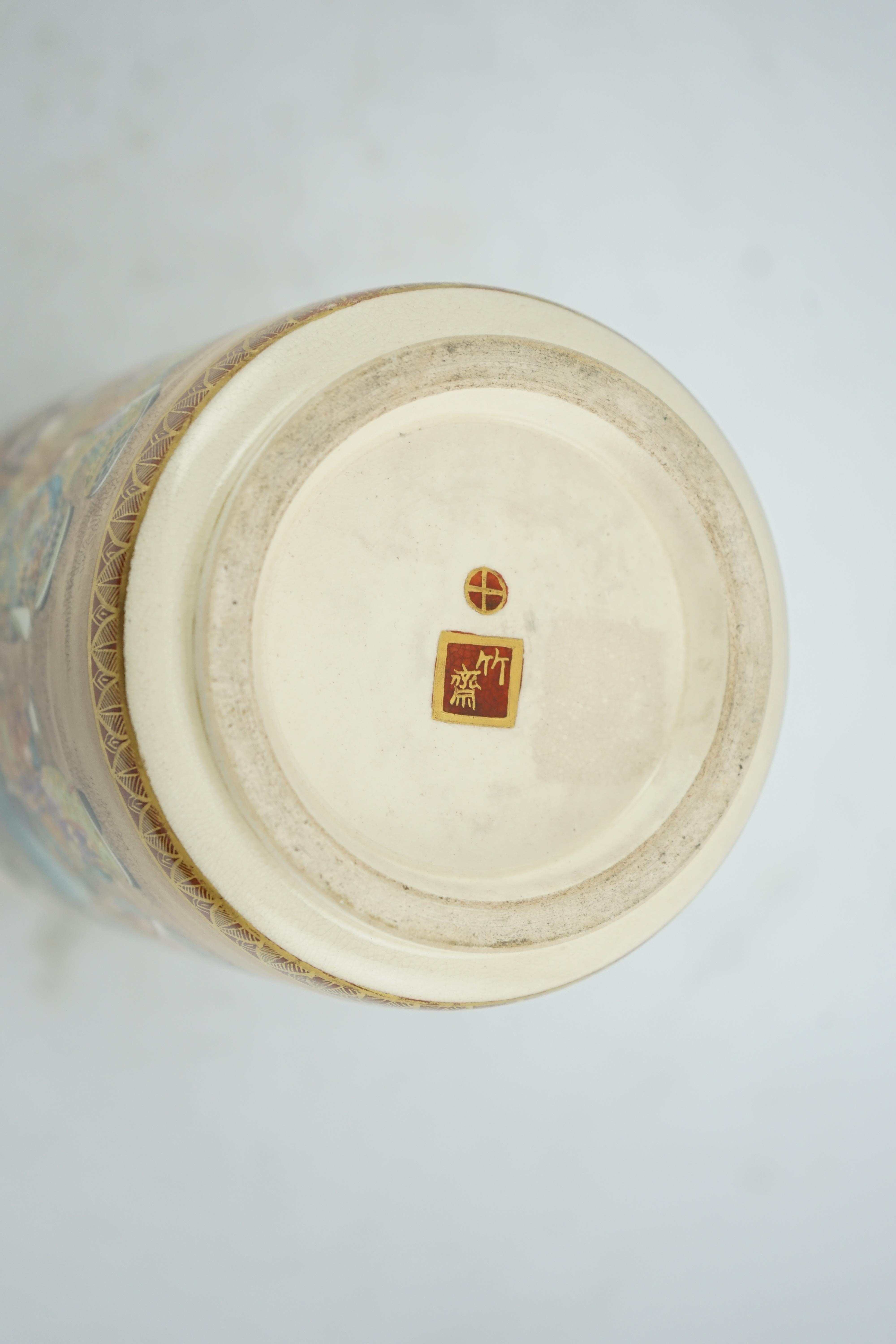 A Japanese Satsuma ‘Spring festival’ cylindrical vase, Meiji period